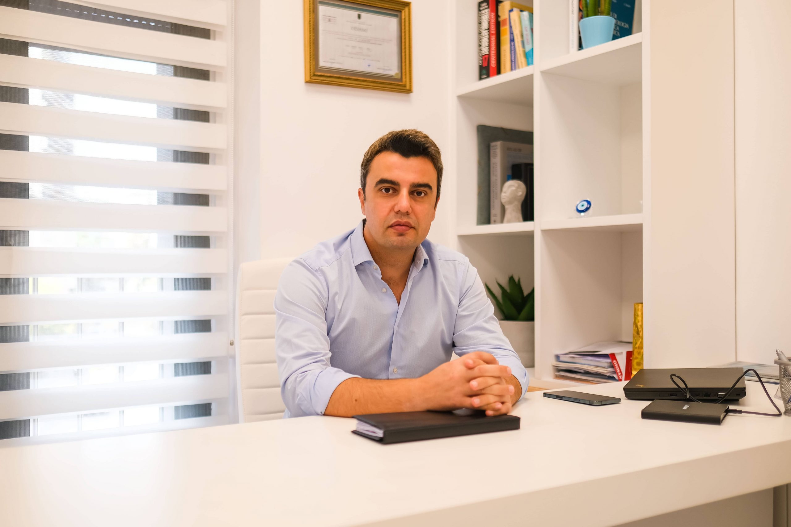 Dr. Roven Sinani